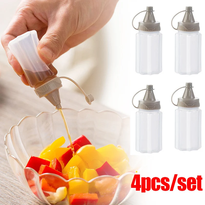 

4PCS/Set Transparent Spices Bottle with Lid Portable Mini Sauce Seasoning Box Dispenser Salt Spice Jar Sauce Squeeze Bottle