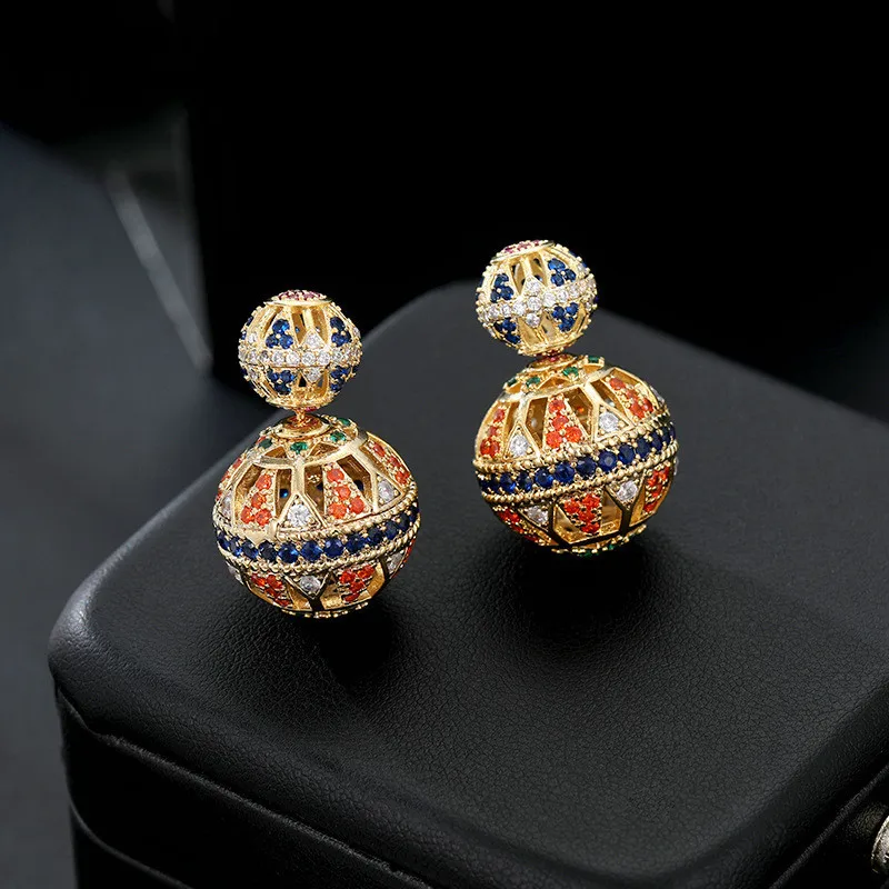 

Europe And The United States Advanced Sense Light Luxury Double-sided Hollow-out Earrings S925 Retro Trend