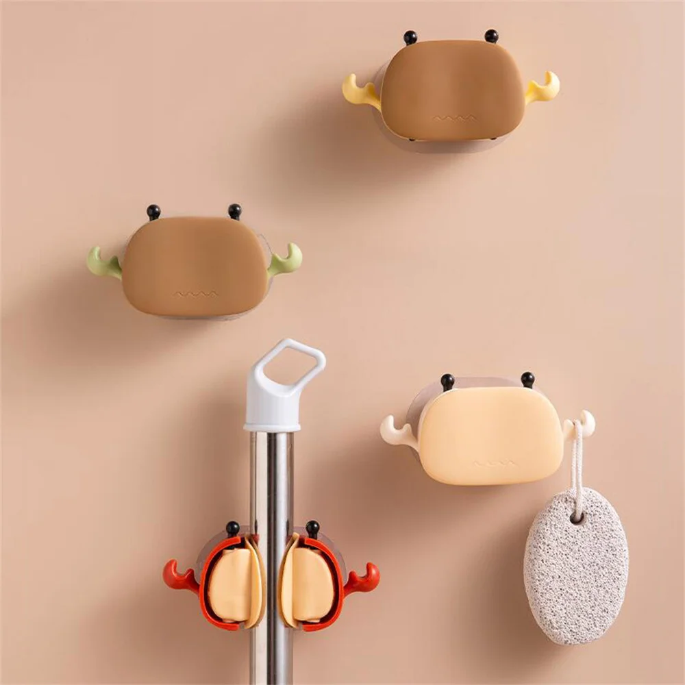 

Punch-free mop rack Cute bathroom mop hook bathroom sticky hook broom hanger card seat mop clip Home Storage Organization Shelve