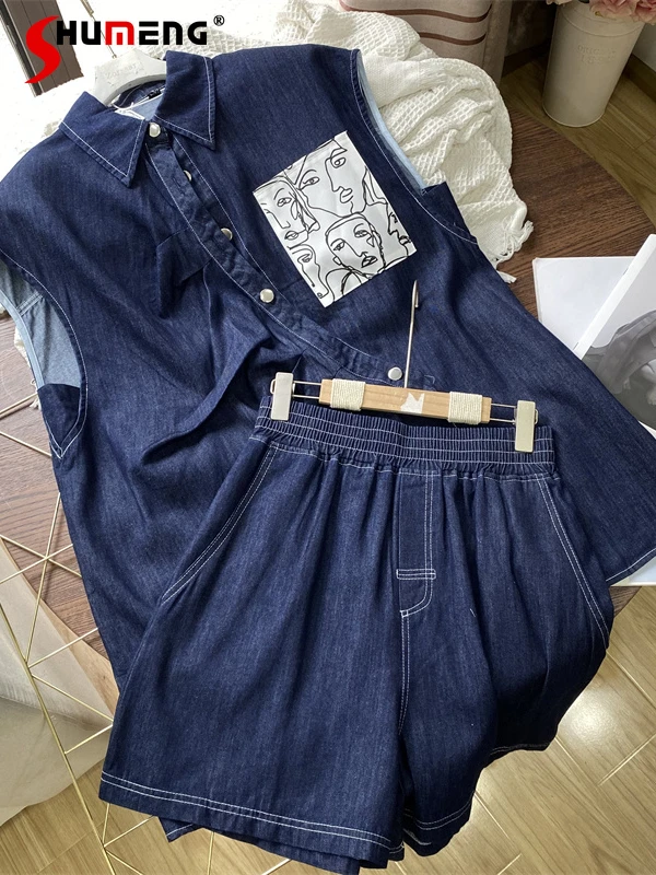 

2022 Summer New European Goods Irregular Buckle Washed Sleeveless Denim Shirt Elastic High Waist Denim Shorts Two Piece Suit