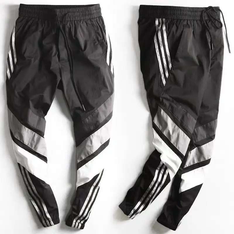 

Spring New Feet Pant Summer Casual Men Beam Pants Tooling Nine Version Youth Pants Points Male Closing Male Pants Sports Feet