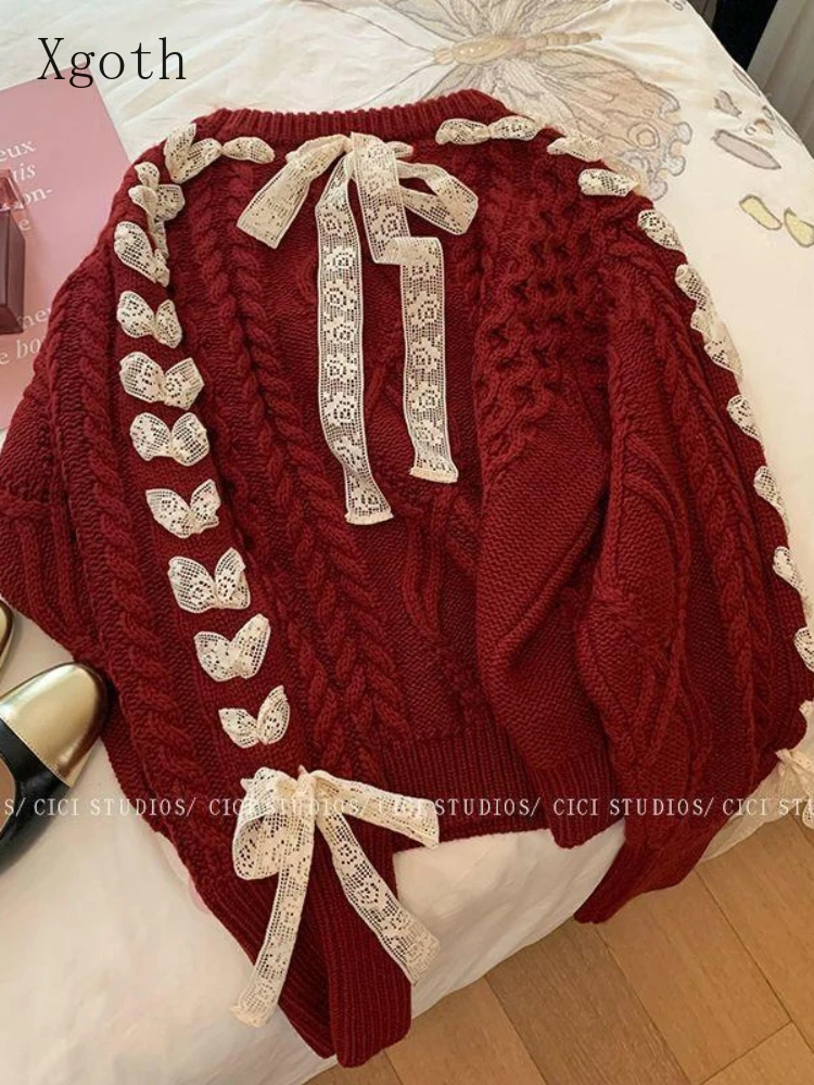 Женский трикотажный пуловер в стиле оверсайз с бантом