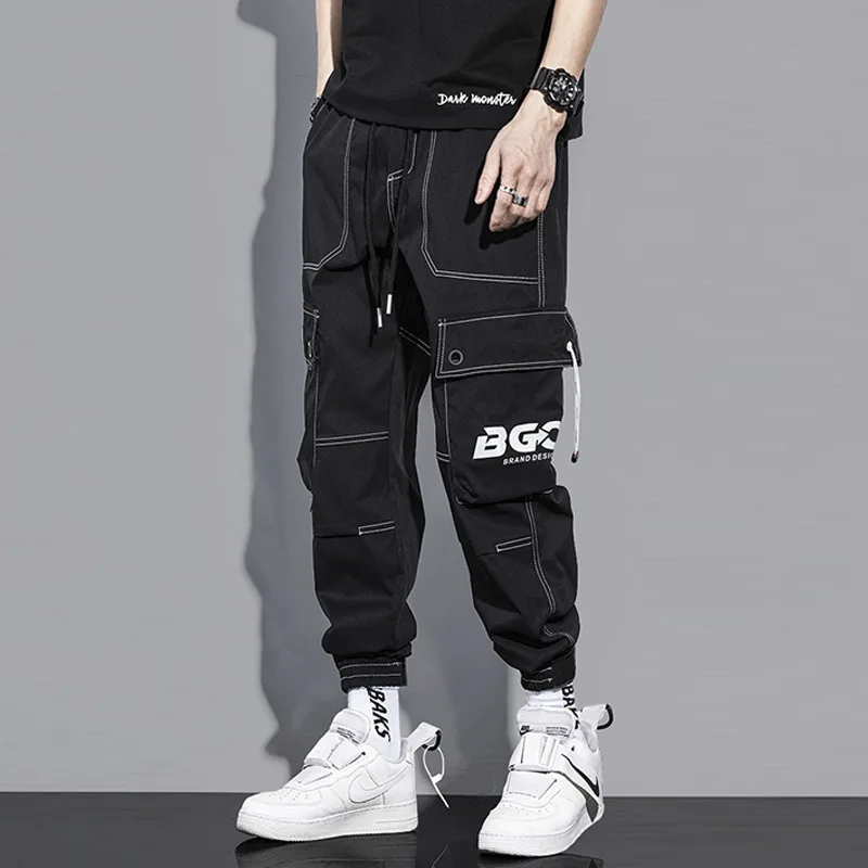 

Брюки-карго мужские в стиле панк, повседневные джоггеры, черные спортивные штаны, практичные украшения с карманами, модная одежда в стиле хип-хоп, на осень