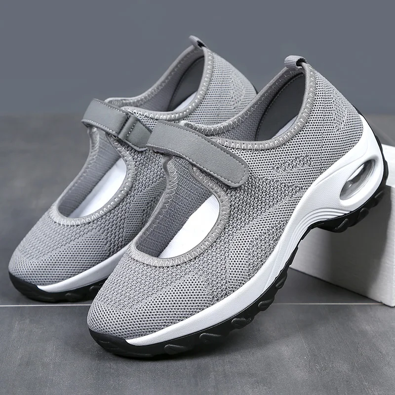 

2023 large size cross-border air cushion shoes elderly shoes flying woven shoes mother shoes sports shoes