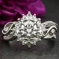 romantic six petal lovely snowflake ring is suitable for women to wear with dazzling cubic zircon inlaid in silver color