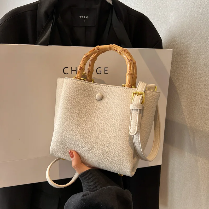 

Fashion Bamboo Handle Bucket Bag Designer Lichee Pattern Handbags Commute Shoulder Crossbody Bags for Women 2023 Ladies Purses