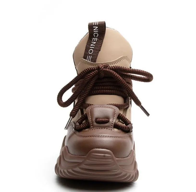 Женские кроссовки из натуральной кожи на танкетке 7 5 см