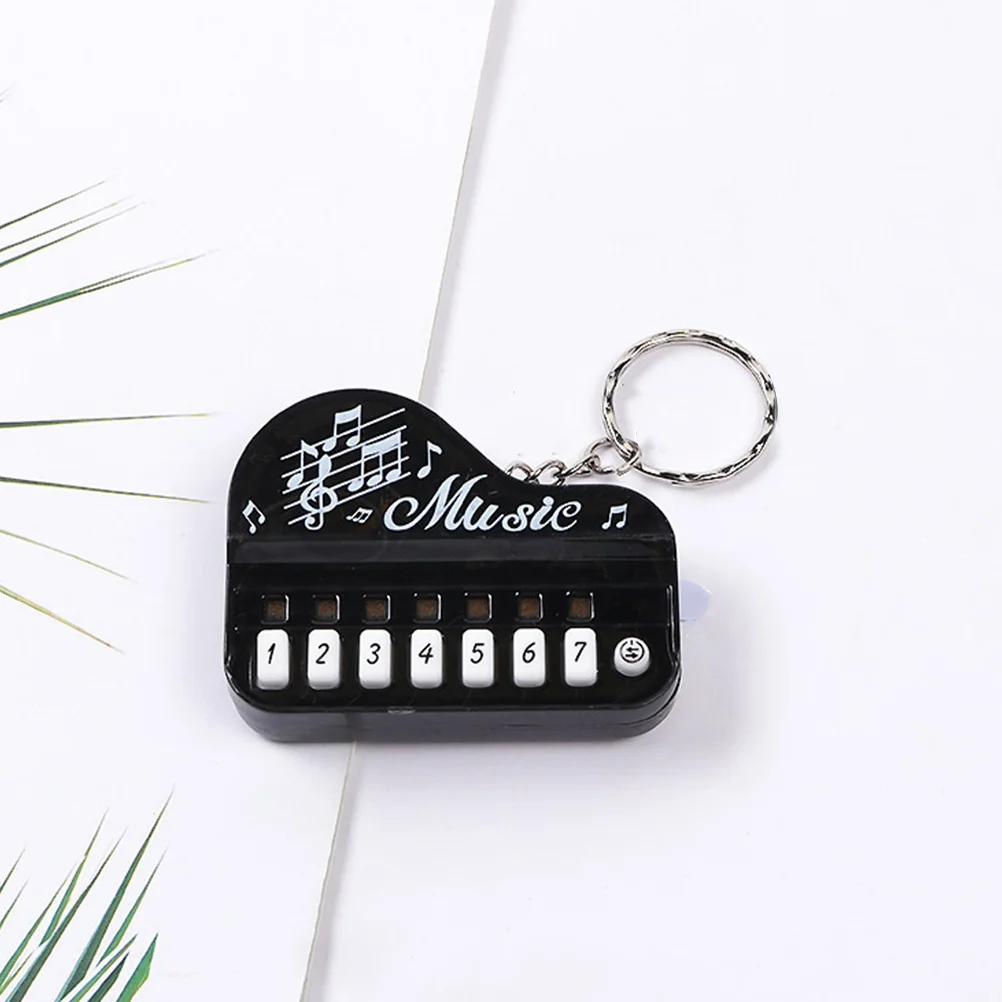 

Изысканный брелок для ключей с клавиатурой пианино, Подвесные брелки для ключей для рюкзаков, компактный пластиковый Музыкальный брелок