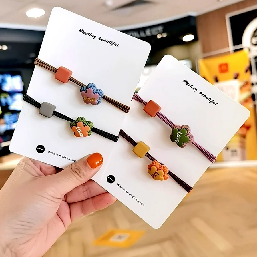 

Веревка для волос Женская весенне-летняя Новая цветная веревка для волос с любовным шариком круглая веревка для волос сетчатая красная мод...