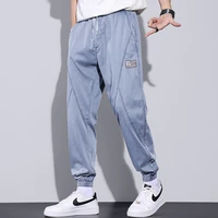 fashion jeans mens korean trend ice silk bundle foot pants summer new loose thin elastic harun pants youth dropshipping