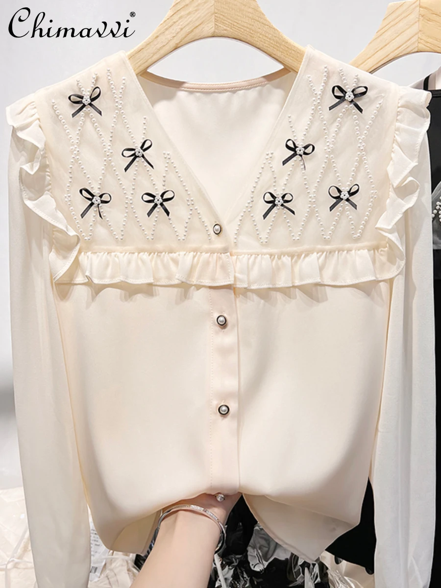 

Женская блузка с V-образным вырезом и длинным рукавом