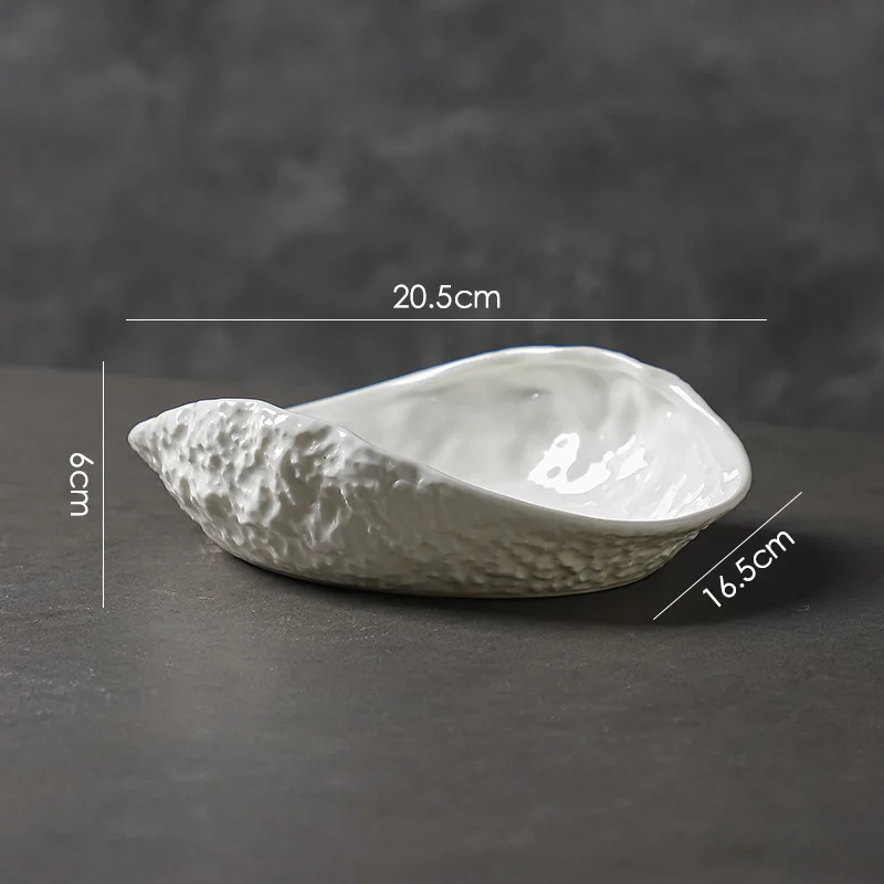 

Керамическая тарелка-ракушка