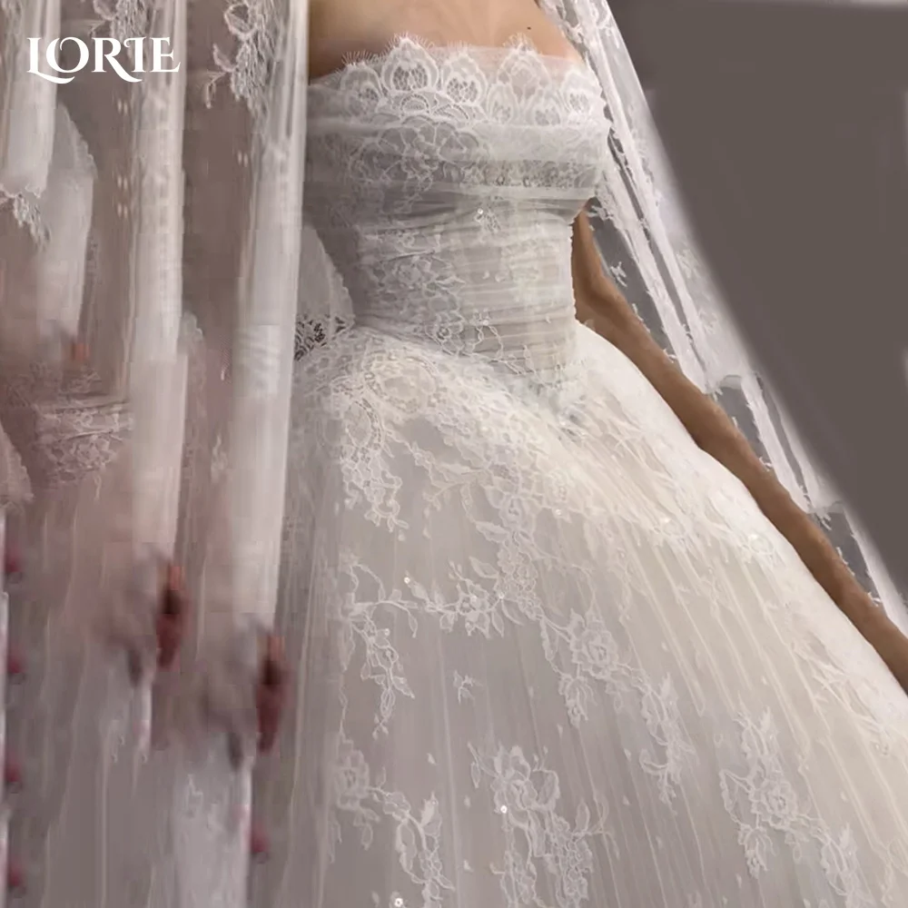 Фото Свадебное платье LORIE: сексуальное, кружевное, без бретелек, с плиссировкой и аппликациями, фасон «сердечко», А-силуэт, кружевное, на заказ, больших размеров, для невесты (vestidos de novia) №1