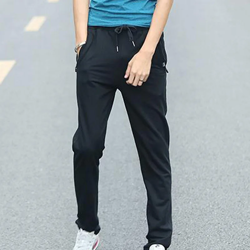 

NEW 2022 Spring Summer Men's Casual Pants Students City Zipper Pocket Elastic Waist Stretch Men Sweatpants Feet Long Trousers
