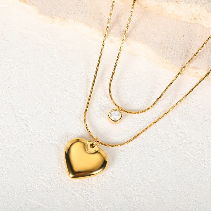 

Цепочка с подвеской в виде сердца из 18-каратного золота