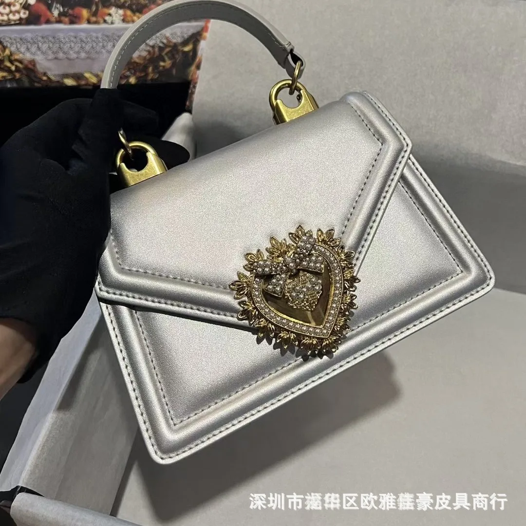 New European and American fashion leather ladies bag senior sense of head layer cowhide slanting chain female bag pearl bag