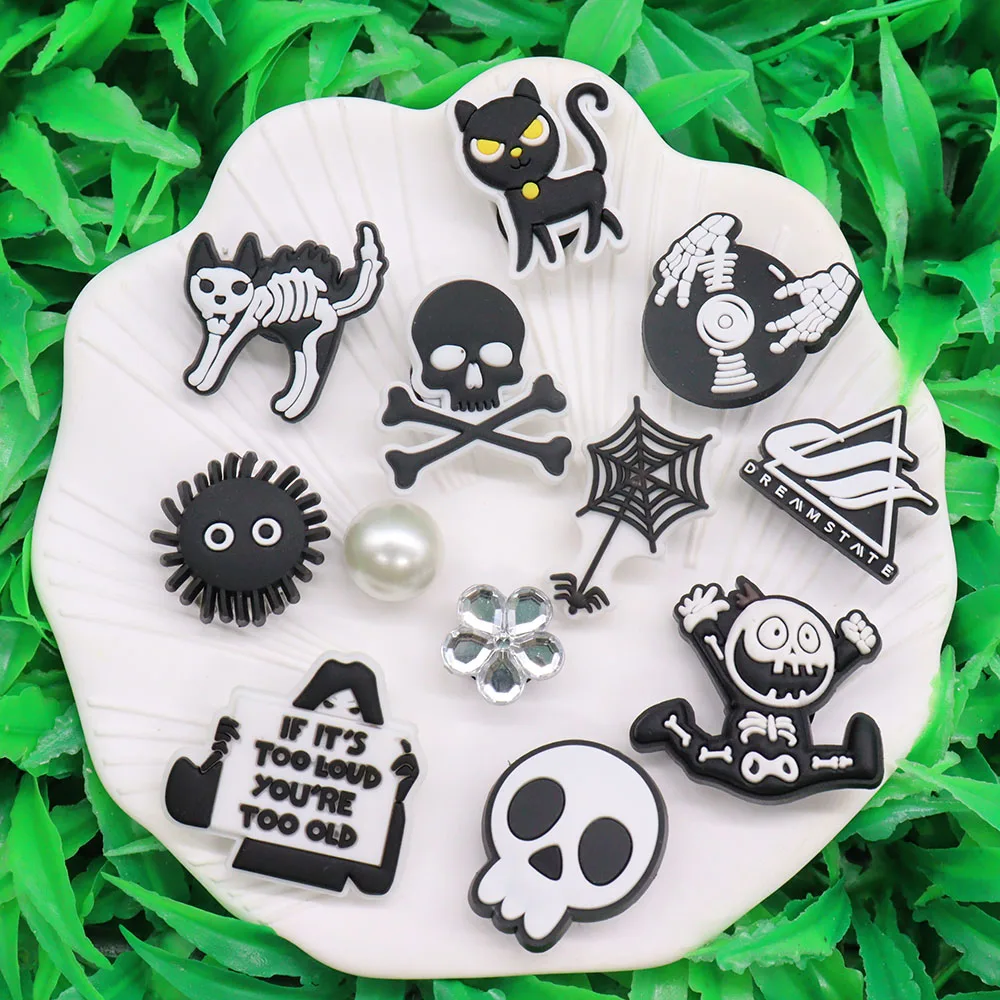 

1-12PCS Black Skull Cat Ghost Shoes Charms Accessories Buckle Clog Sandals Decorations DIY Wristbands Croc Jibz Kids Party Gift