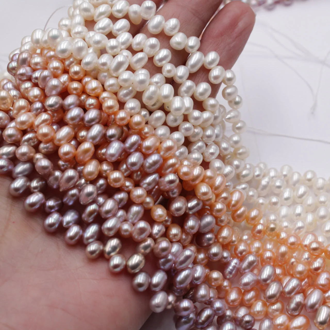 

New hot selling natural freshwater pearl loose beads little blemlish rice beads 5mm DIY handmade semi-finished necklace material