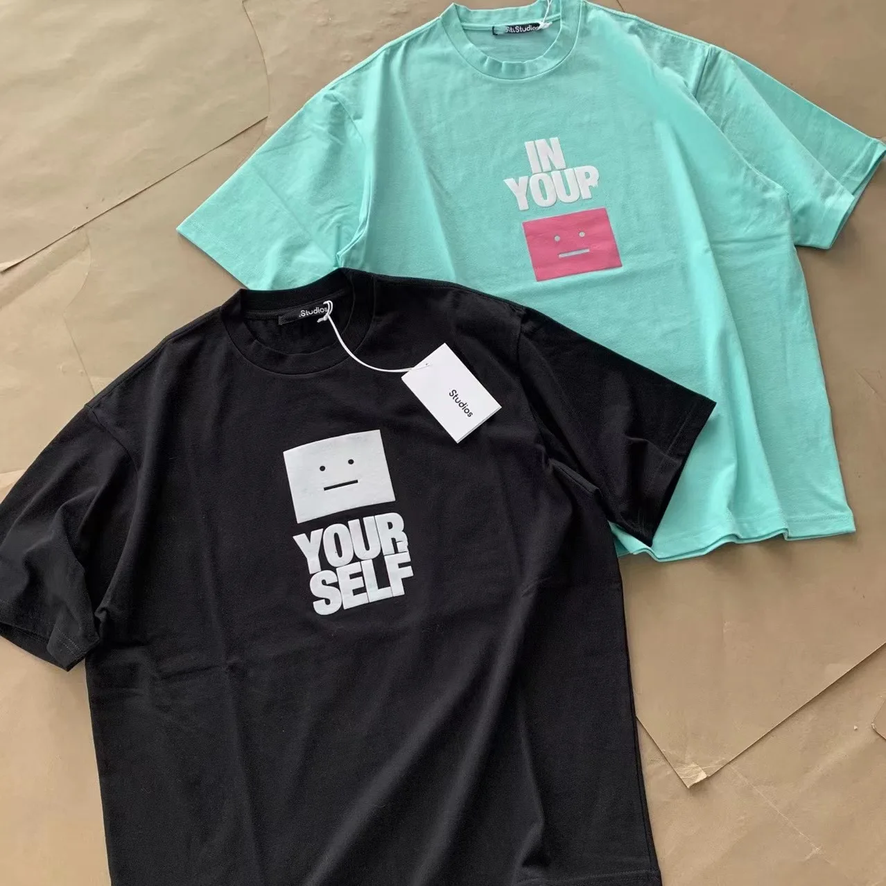 

AC Studios Designer 2022 Spring Summer T-shirt Acne Smiling Face O Neck Cotton Loose Print Short Sleeve for Men and Women Couple