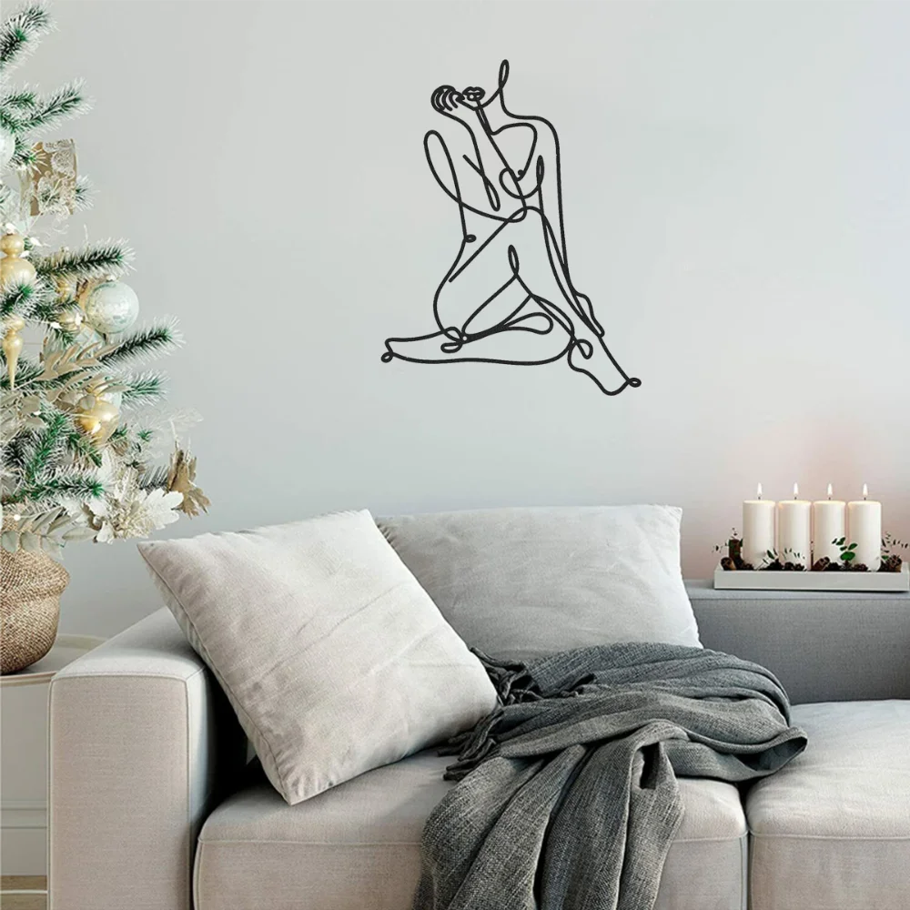 Изящное женственное минималистичное искусство проволоки женского силуэта