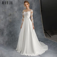 a line three quarter sleeve wedding dresses 2022 sheer o neck lace appliques sweep train chiffon bridal gowns with button