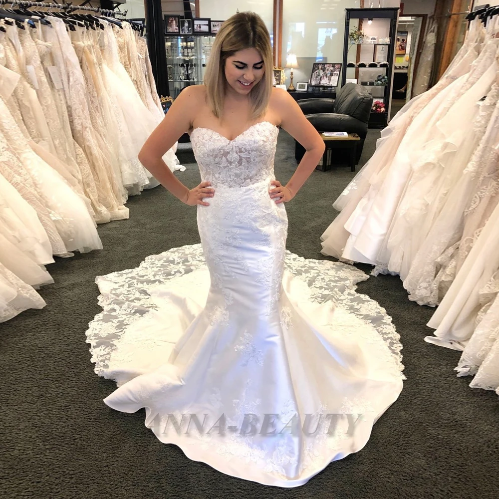 

Anna Stain Elegant Sleeveless Wedding Dresses Mermaid Illusion Appliques Button Sweep Train V Neck Vestidos De Novia Customised