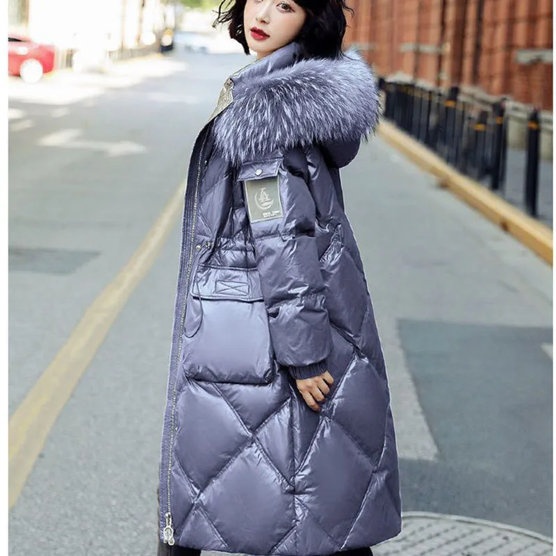 Женский зимний пуховик с капюшоном мехом енота |