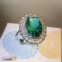 personality oval firework craft 925 silver inlaid emerald design sense four claw ring party travel wedding accessories