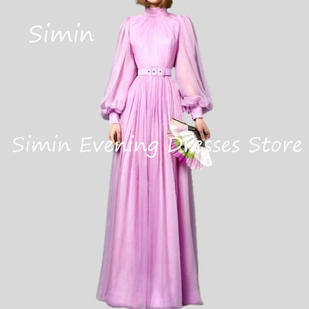 

Шифоновое платье-трапеция с круглым вырезом и оборками