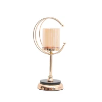 single gold metal candlestick candle holders