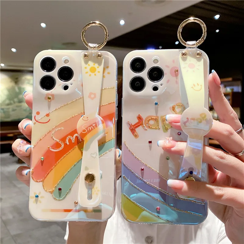 

Luxurious Diamond Rainbow Phone Holder Case for iPhone 14 Plus 13 12 11 Carcasa X XR XS Fashion Soft Silicone Wrist Strap Cover