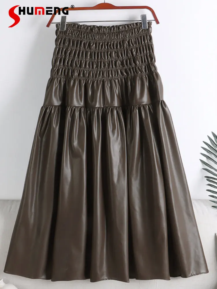 

PU Leather Pleated Midi Skirt for Women Spring 2023 New Women's High Waist Slim Solid Color Stitching Big Hem Mid-Length Skirt