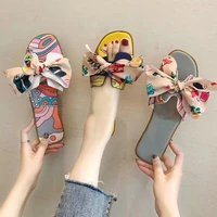 net red sandals female summer wear new fashion wild bow h slippers female flat bottom beach shoes