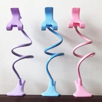 universal sturdy plastic mobile phone holder suitable for tablet computers smart phones and e readers