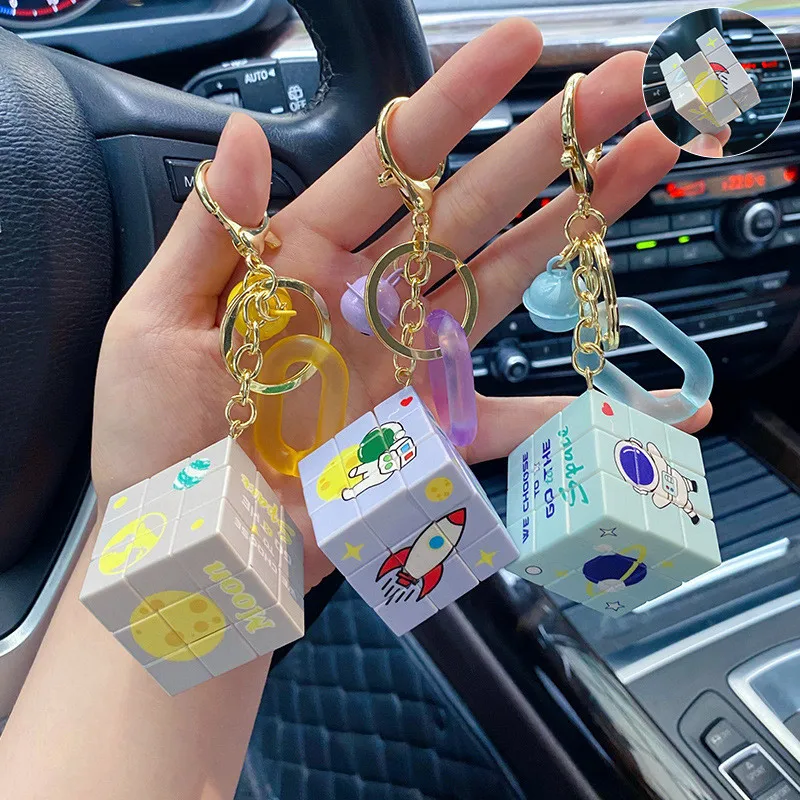 

YW GAIRU Educational Fingertip Decompression Toy Third Order Rubik's Cube Keychain Cartoon Spaceman Female Cute Bag Pendant