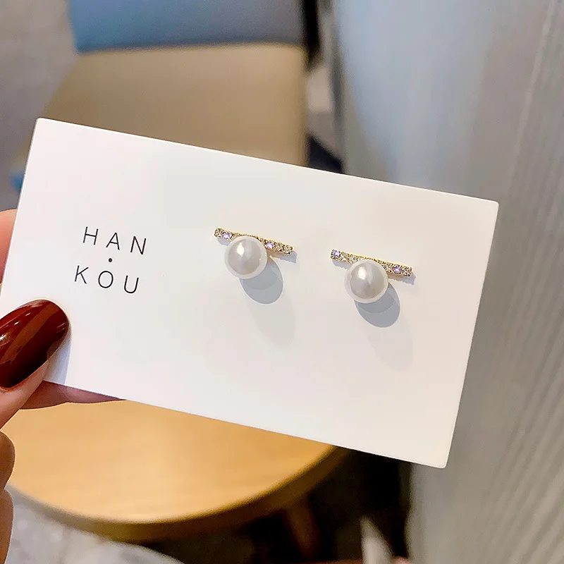 

Серьги-гвоздики из серебра пробы с жемчугом