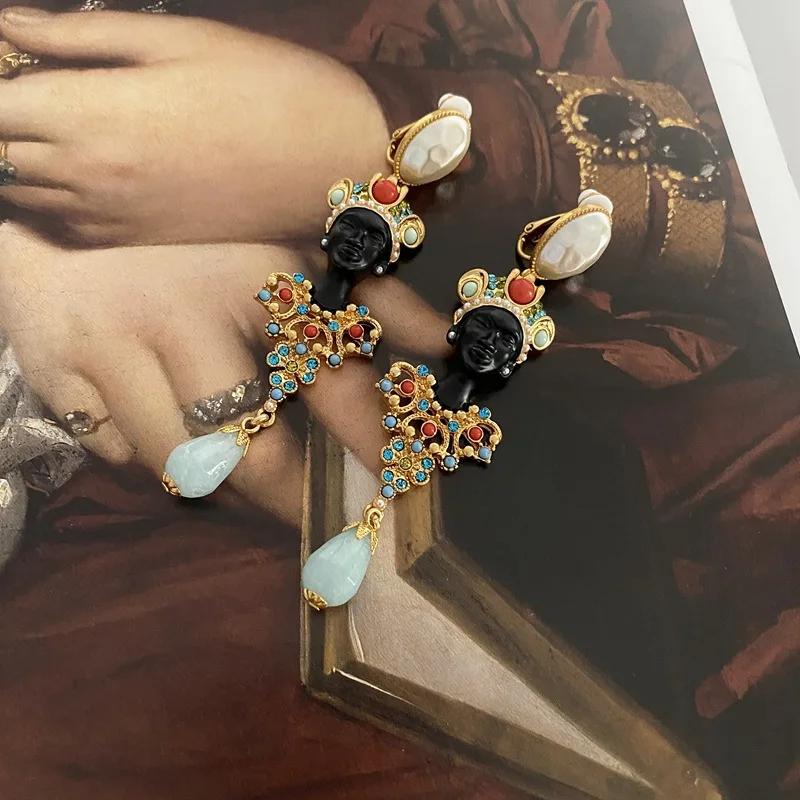 

Egyptian sculpted colorful pearl ear clips earrings