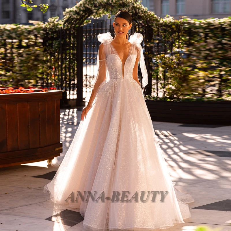 

Anna Elegant Deep V Neck Wedding Dresses Bling Tulle Off The Shoulder Appliques Court Train Lacing Up Robe De Soirée De Mariage