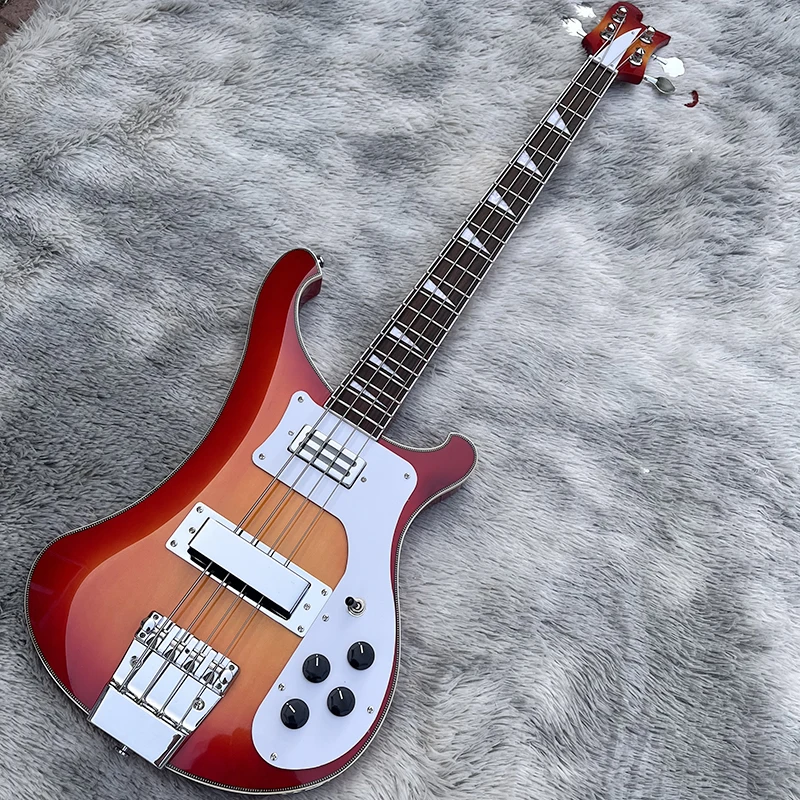 

This is a professional 4-string bass electric guitar with a sunset color changing bright face. It has a beautiful tone