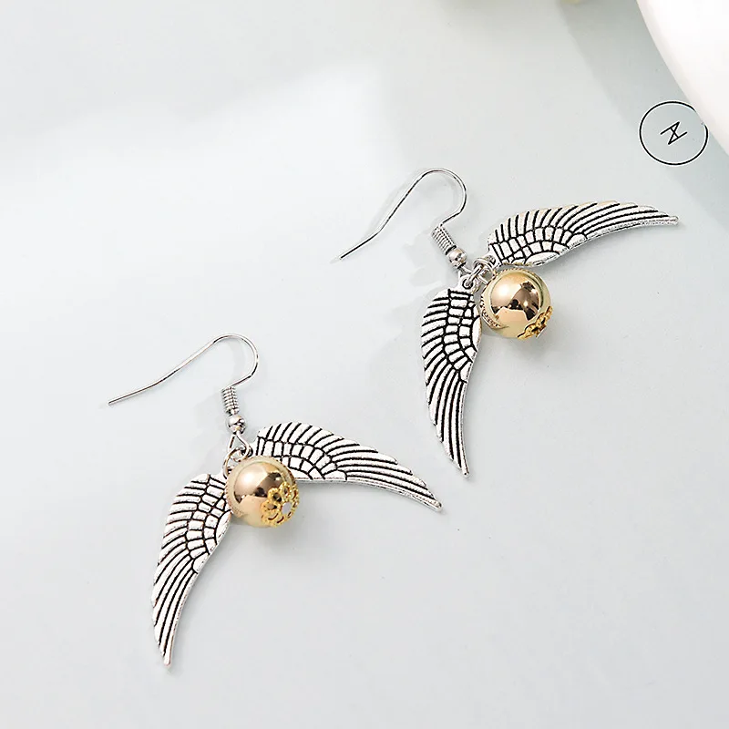 Женские популярные круглые серьги-гвоздики с крыльями в стиле ретро |