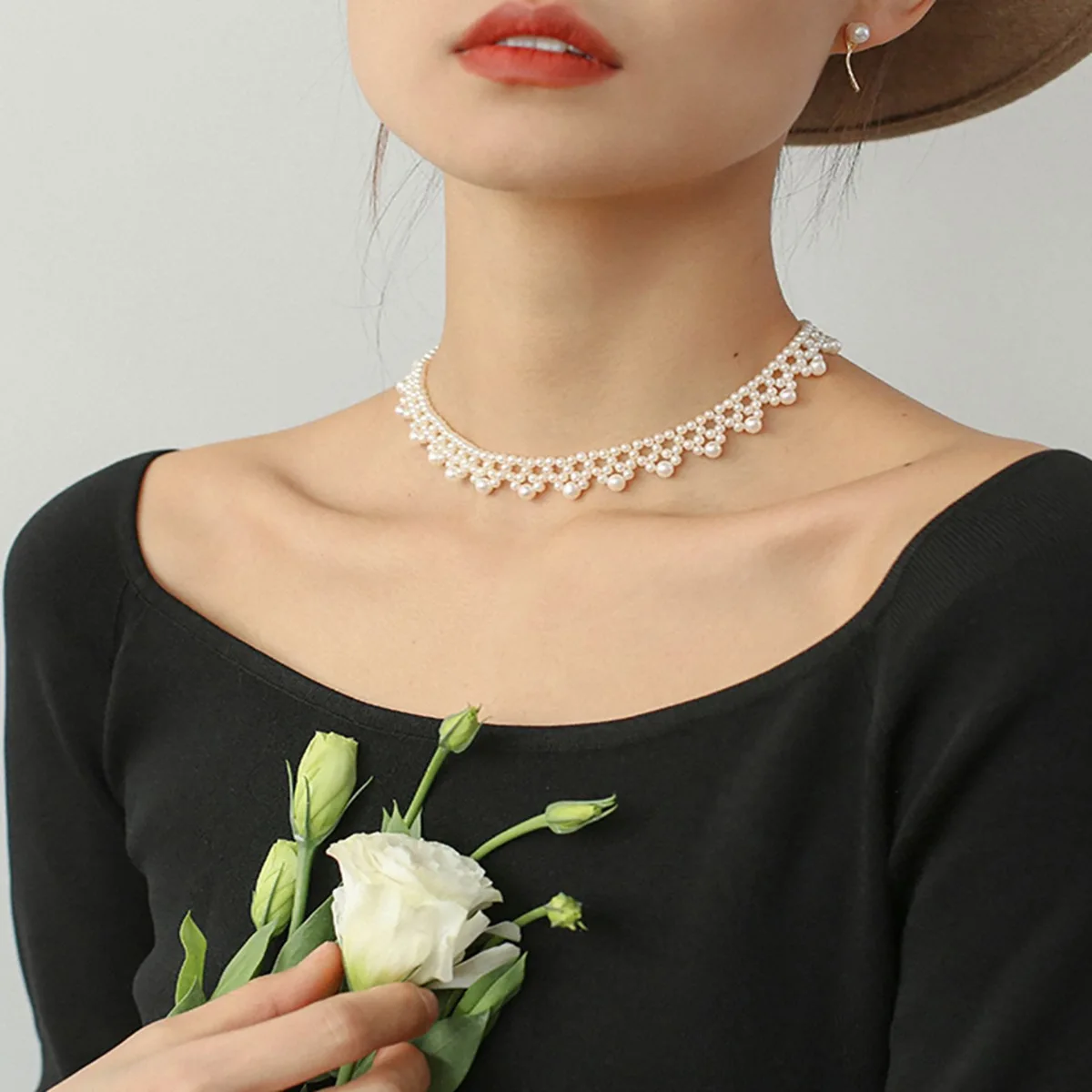 

Woven lace tassel clavicle temperament imitation pearl hollow joker necklace