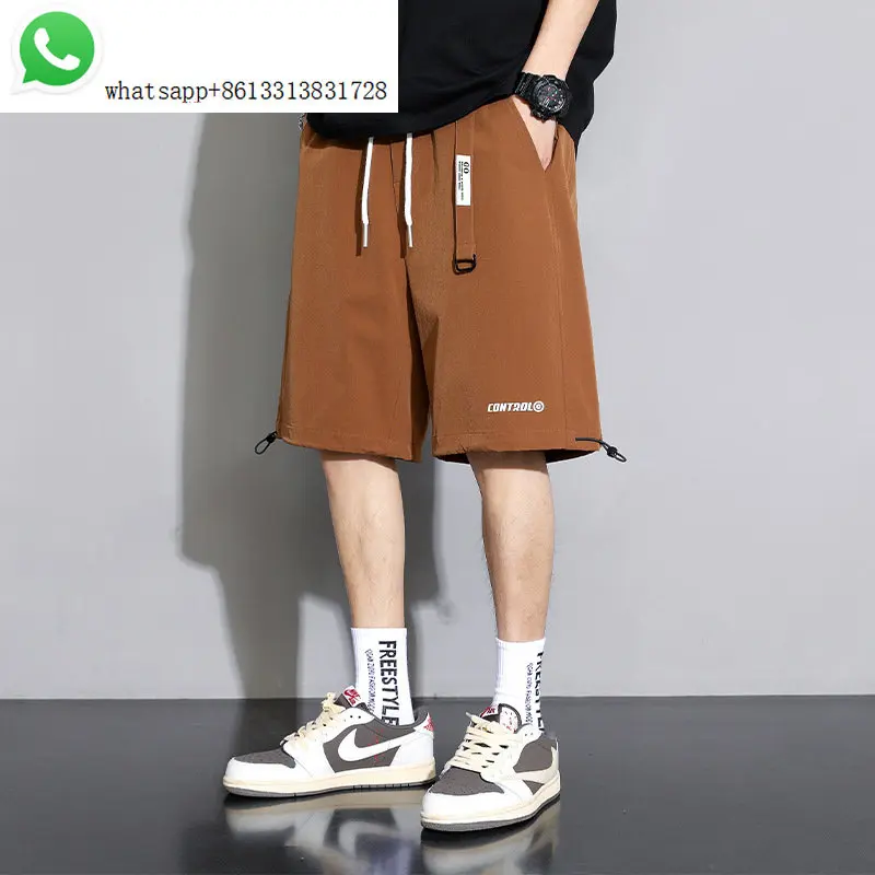 

2023 summer new men's casual shorts draw rope design everything straight loose five points beach pants medium pants