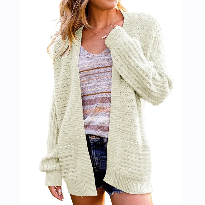 Solid color hollow pocket knitted cardigan Autumn and winter new popular lantern sleeve sweater women clothes