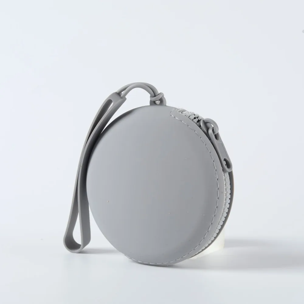 

Силиконовый круглый кошелек для монет