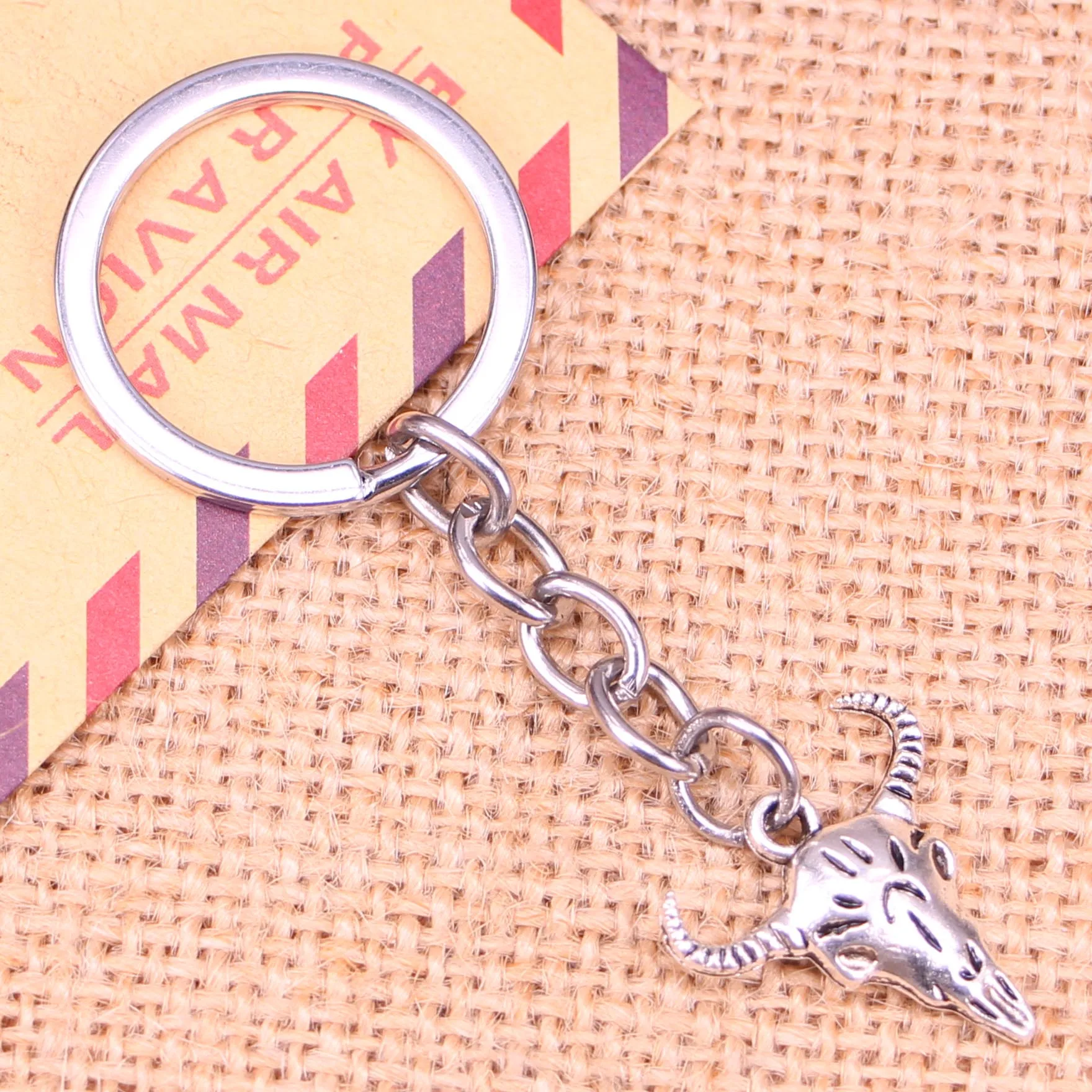 

20pcs New Fashion Keychain 21x20mm skull bull ox Pendants DIY Men Jewelry Car Key Chain Ring Holder Souvenir For Gift