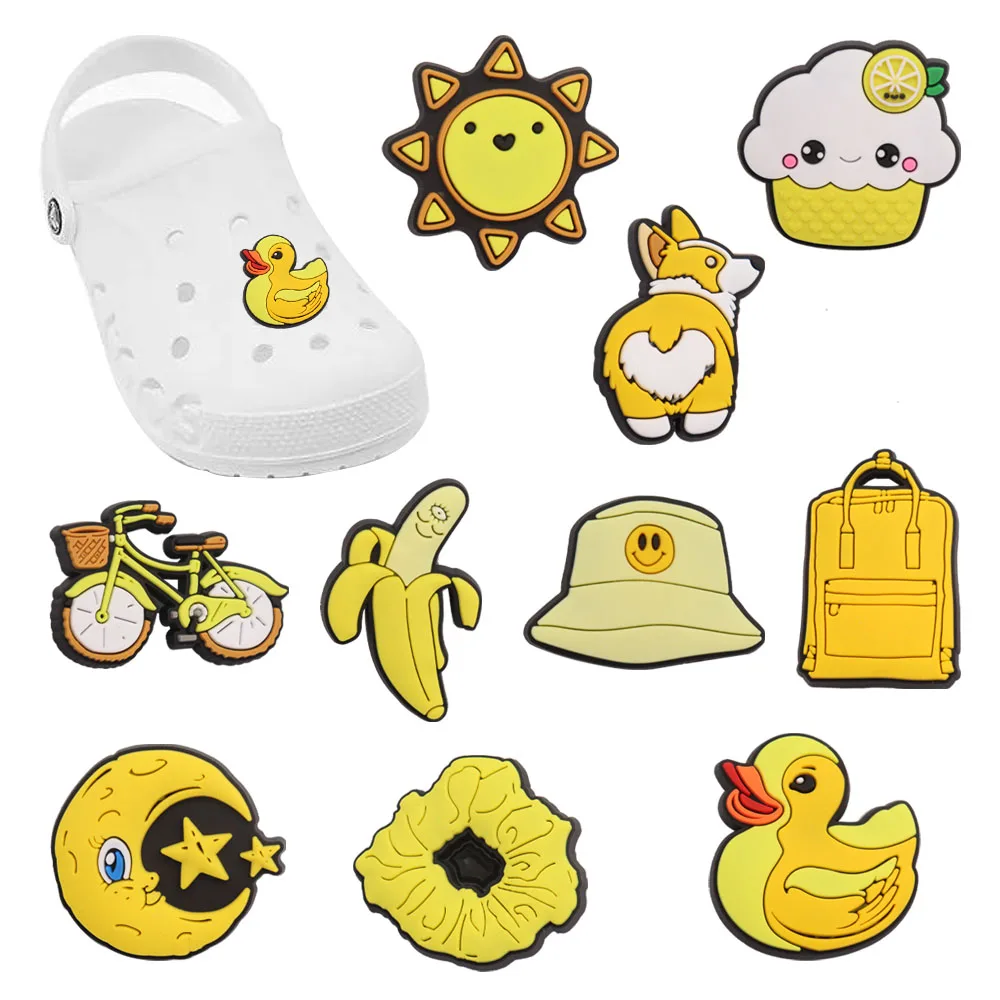 

Wholesale 50pcs Shoe Charm Yellow Moon Sun Banana Duck Bike PVC Cute Garden Shoe Buckle Decoration Fit Croc Jibz Kids X-mas Gift