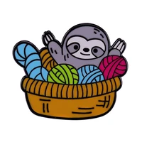 sloth lying in yarn basket brooch wool and critters mix and match badge cute hard enamel pin jewelry accessory