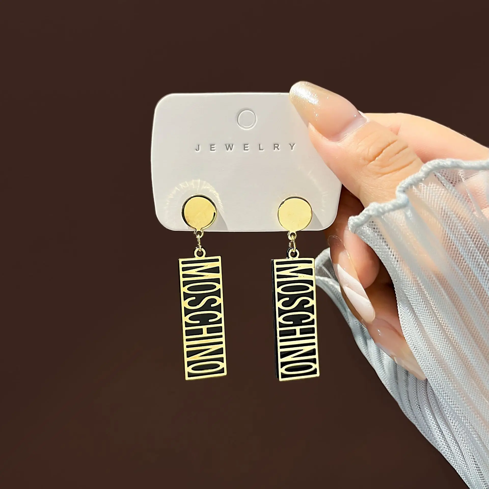 

Fashion Designer Minimalist Style Irregular Screwed Metal Woman Earrings Available In Two Colours