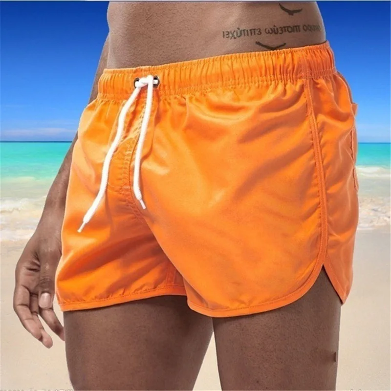 Men's solid color beach pants, fashionable multi-color straight tube loose drawstring sports surfing and swimming shorts
