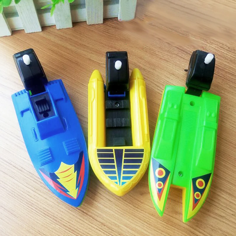 

1Pc Plastic Clockwork Chain Speedboat Motorboats Mechanical Wind Up Toys Water Sports Summer Children Novelty Games Classic Toys